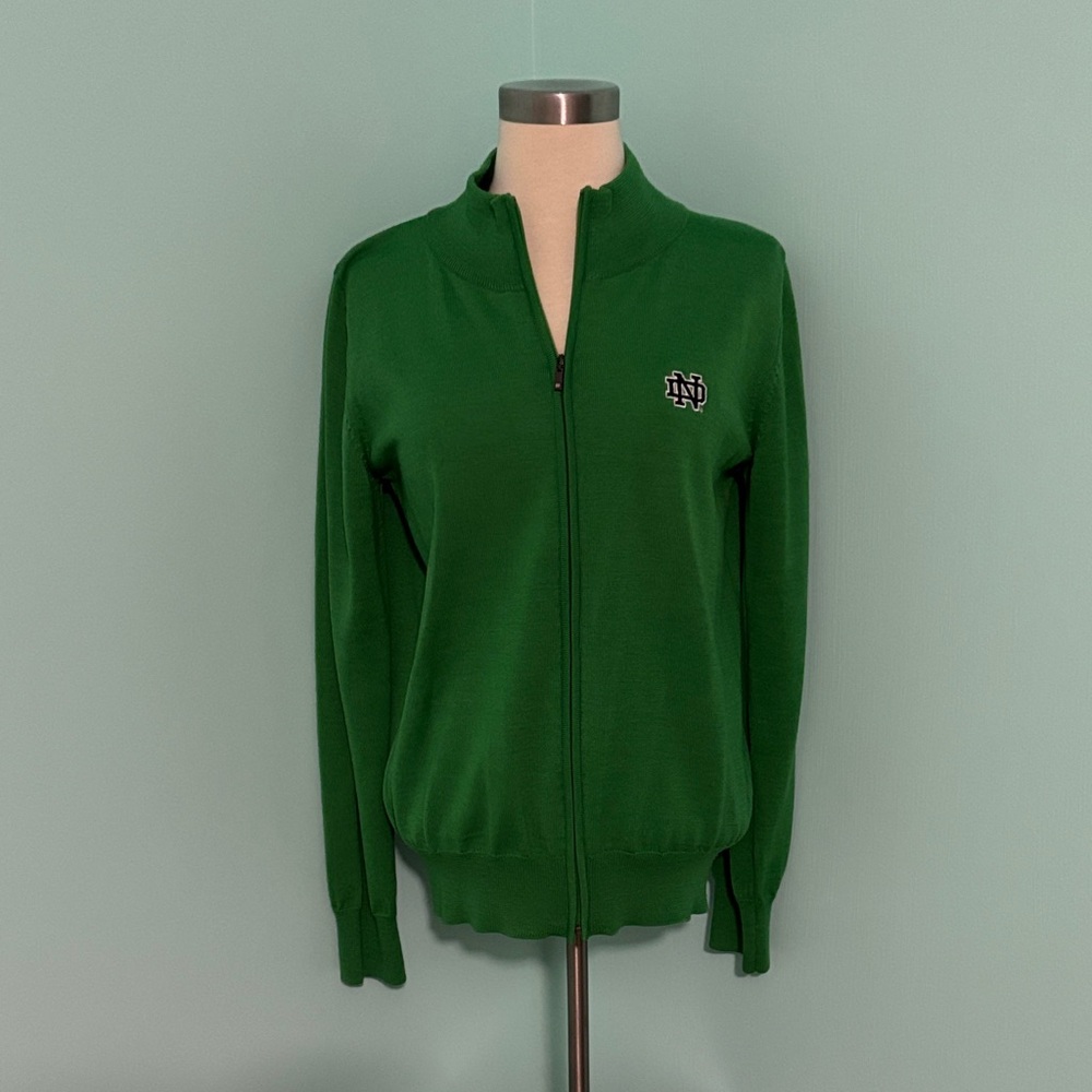 Notre Dame Irish Green Zip-Up Jacket with ND Logo. Zipper has ND logo also.
